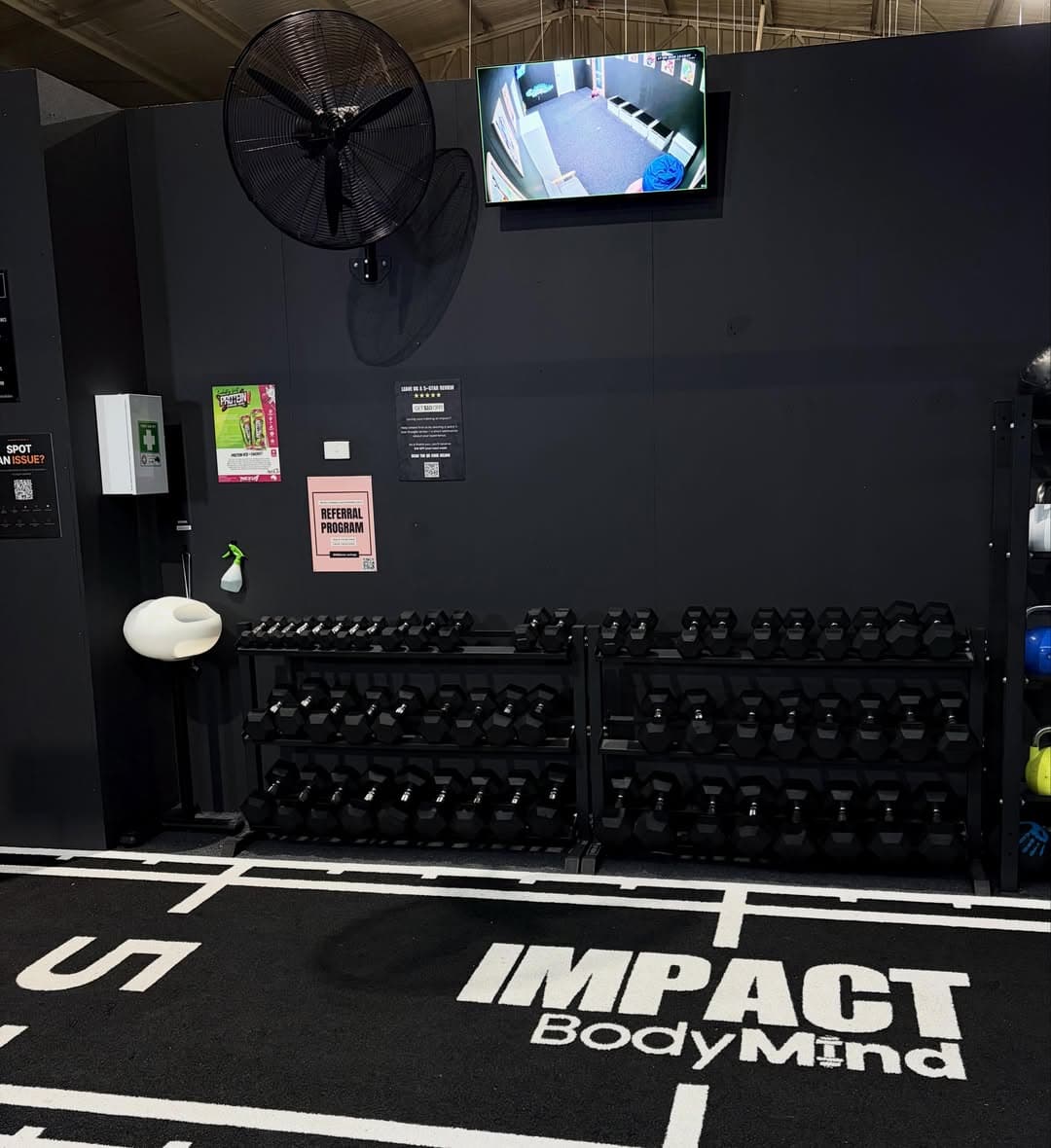 Live CCTV monitor on the gym floor showing the creche room at Impact Body Mind Moama
